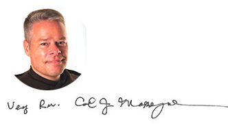 Photo of Fr. Carl and his signature