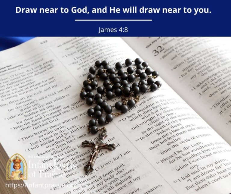 Black beaded rosary bundled and set on bible page