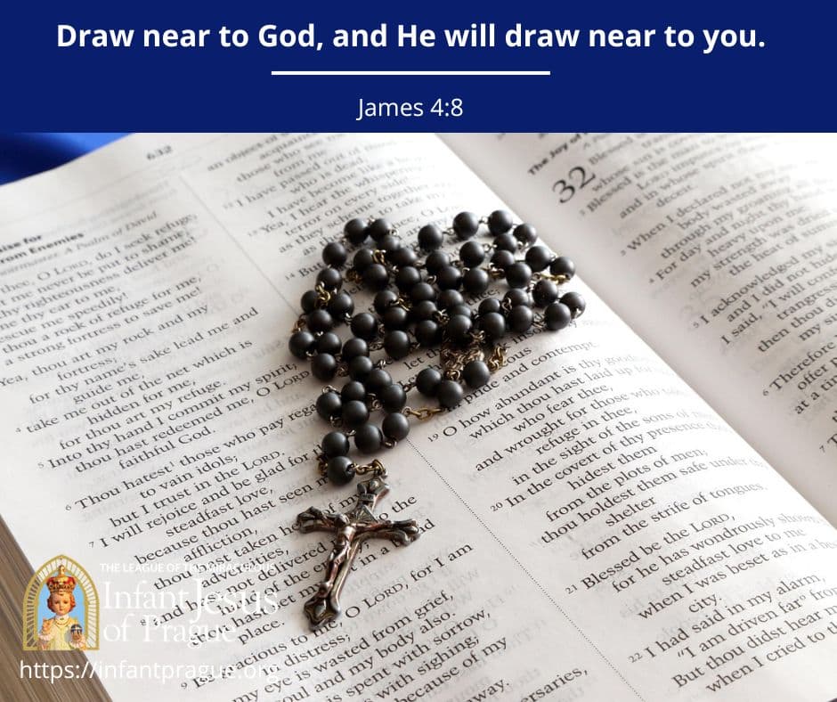 Black beaded rosary bundled and set on bible page