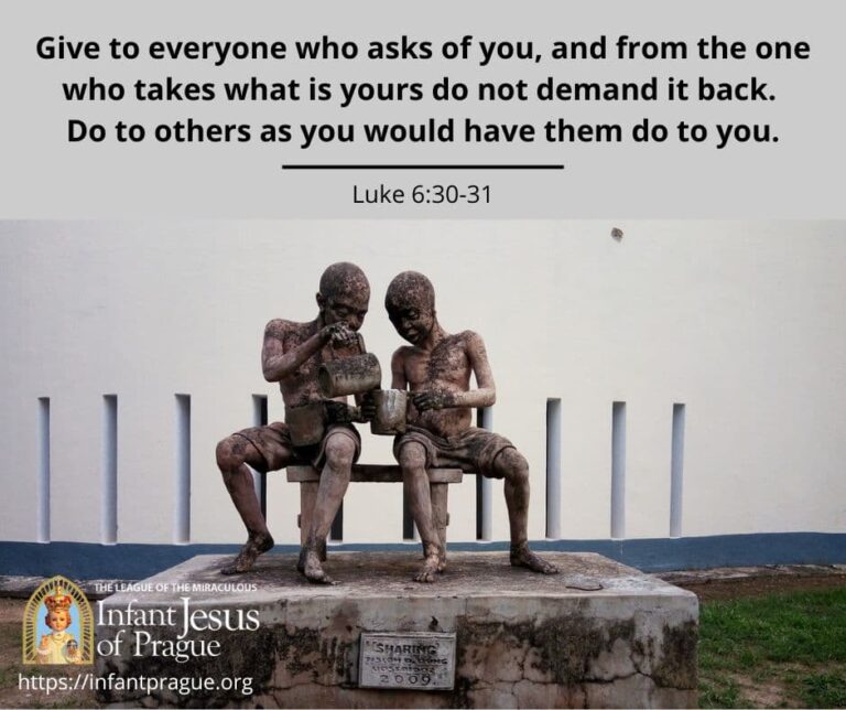 stone statue of two children depicting one child sharing with the other